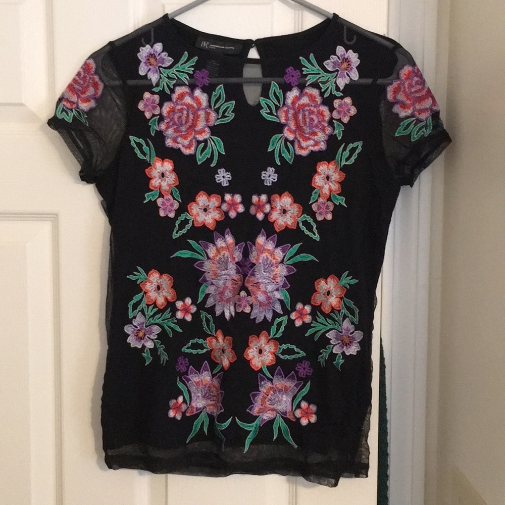Black top with floral embroidery